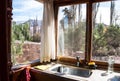 Windows with outdoor mountain view on a corner kitchen Royalty Free Stock Photo