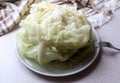Cabbage Head For Making Cabbage Rolls On The Background Of A Kitchen Napkin, Close-up, Side View