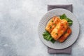 Cabbage rolls with beef, rice and vegetables on the plate. Stuffed cabbage leaves with meat. Gray concrete table Copy space