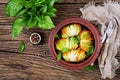 Cabbage rolls stuffed with rice with chicken fillet in tomato sauce