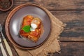 Cabbage rolls stuffed with rice and meat stewed in tomato sauce. Traditional dish, ready-to-eat food Royalty Free Stock Photo