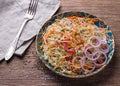 Cabbage salad with carrots, red pepper, onions, cilantro and spices Royalty Free Stock Photo