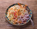 Cabbage salad with carrots, red pepper, onions, cilantro and spices Royalty Free Stock Photo