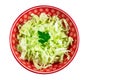 Cabbage salad in a red bowl isolated on a white background Royalty Free Stock Photo