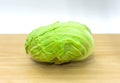 The cabbage on wooden plate.