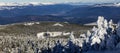 Cabeza de Manzaneda ski resort covered in snow among pine trees on a sunny day Royalty Free Stock Photo
