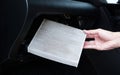 Cabin Air Filter Replacement, Air filter in the cabin that is dirty after use for a while. Automotive air conditioning, check dust Royalty Free Stock Photo