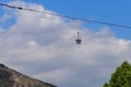 Cabin of cable car against blue sky. Cableway in Tbilisi, Georgia