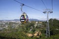 Cabin cable car with tourists rides by cable car in the city of Dalat. Vietnam