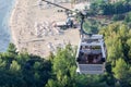 Cabin of cableroad lifting up from the station, view at the Kleopatra beach, the Alanya city, Turkey Royalty Free Stock Photo