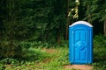 Cabin Of Chemical Toilet In Green Summer Forest