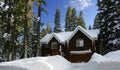 Cabin covered by fresh snow