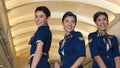 Cabin crew dancing with joy in airplane Royalty Free Stock Photo