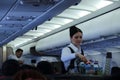 Cabin crew serving refreshments