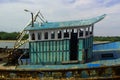 The cabin of dilapidated fisherman boat on a indian small harbor.