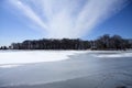 Cabin on frozen lake