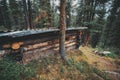 A cabin half buried in the hillside