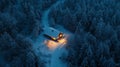 A Cabin with Lights in a Snowy Forest at Night Royalty Free Stock Photo
