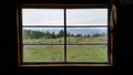 In Cabin Looking Out Old Window