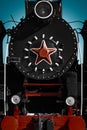 Cabin of old soviet steam locomotive with red star