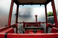 Cabin of red retro tractor