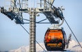 Cabin of ropeway full of skiers