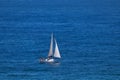 Cabin Sailing Boat On Open Blue Ocean Royalty Free Stock Photo