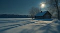 A Cabin in the Snow With Long Shadows Cast by the Winter Sun Royalty Free Stock Photo