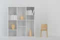 Cabinet with books and vases inside in the empty new house, 3d rendering