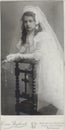 1908 cabinet card of a young girl dressed in a white dress and veil, for first or holy communion