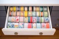 cabinet drawer filled with rolls of colorful washi tapes