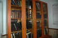 A cabinet with Jewish holy books. Torah, Siddur, Talmud, Tanakh. Synagogue in Israel