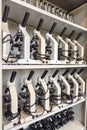 Cabinet with rows of microscopes on high school