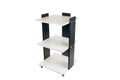 Cabinet or shelving unit on wheels with shelves on a white isolated background. Combined black with white chipboard