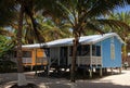 Cabins on stilts on the small island of Tobacco Caye, Belize