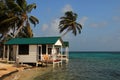 Cabins on stilts on the small island of Tobacco Caye, Belize