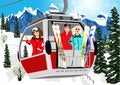 Cable car or booth carrying skiers in mountains