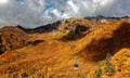 A cable car flying over the beautiful autumn valley in Tateyama Kurobe Alpine Route, Toyama, Japan Royalty Free Stock Photo