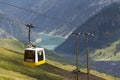 Cable car gondola in Alps mountains near Livigno lake Italy Royalty Free Stock Photo