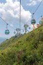 Riding the cable car at ocean park hongkong, day suspended gondola mountainside outdoors