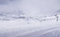 Cable car leading several kilometers on mountain tops. Royalty Free Stock Photo