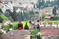 Cable car from Pilatus mountain top approaches to the city district