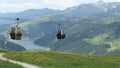 Cable car reaching the Isskogel mountain peak at village Gerlos in Tirol Austria. Aerial view around Kitzbuehel Alps