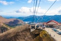 Cable car or ropeway and tourist is moving up to the top of the mountain at Akechidaira plateau in winter.