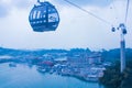 Cable car on Sentosa Island Singapore is over the sea, which is an important shipping port of Southeast Asia Royalty Free Stock Photo