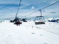 Cable car ski slope chairlift mountains Eastern Pyrenees, Andorra, sunny winter day, blue sky Royalty Free Stock Photo