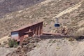 Cable car station at the foot of the Teide volcano. Blue cabin begins to climb to the top. National Park Teide, Tenerife, Canary