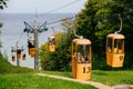 Cable car in Svetlogorsk (Svetlogorsk funicular) with a view of the Baltic Sea, a lift with yellow booths