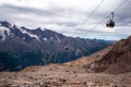 Cable Car in Swiss Alps over beautiful mountain landscape, Switzerland in Europe, beautiful ice and rock landscape Royalty Free Stock Photo