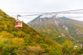 Cable car and tourist at Akechidaira plateau in autumn at Akechidaira Ropeway Station, Nikko, Japan.